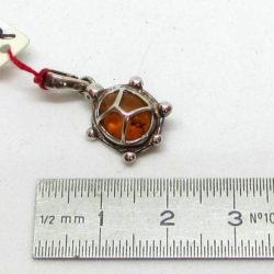 Amber and silver turtle pendant