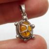 Amber and silver turtle pendant