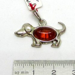 Amber dog pendant on silver. Original and unusual amber dog pendant on silver. Fashionable amber jewellery
