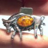 Original bull pendant in amber on silver. Fashionable amber jewellery.