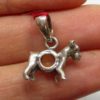 Pendentif chien en ambre sur argent
