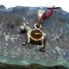 Pendentif chien en ambre sur argent