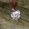 Ce bijou en argent représente un cœur ou il est écrit Je t'aime. Pendentif en argent 925 millième.