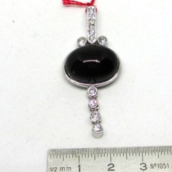 Onyx pendant on silver, The zirconium oxides give it a nice modern jewellery look.