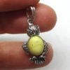 Pendant owl amber on silver
